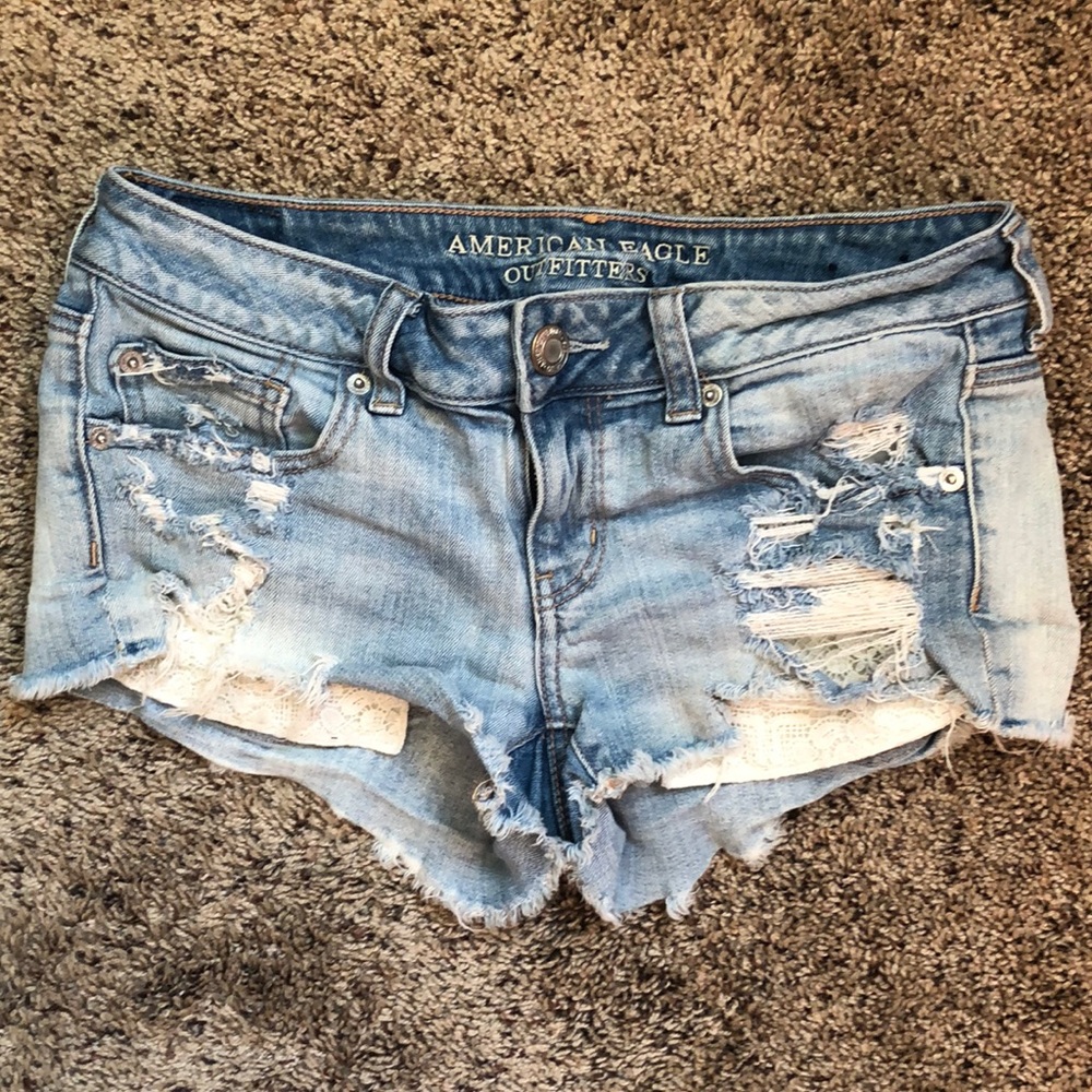 Low rise distressed jean shorts